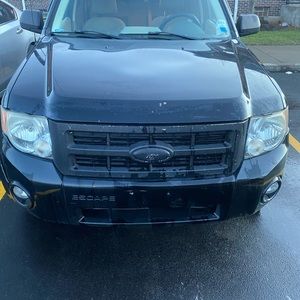 2008 Ford Escape u just need a wheel alignment and brakes done best offer